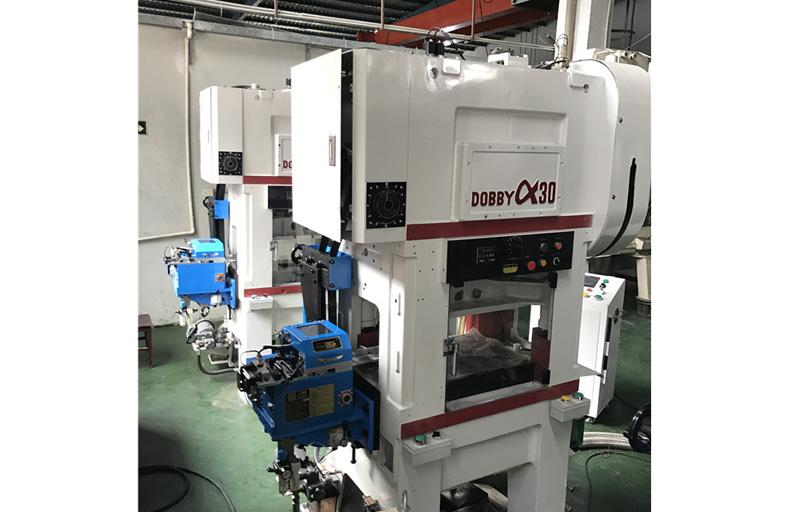 Japan DOBBY punch machine with JoeSure clamp feeder